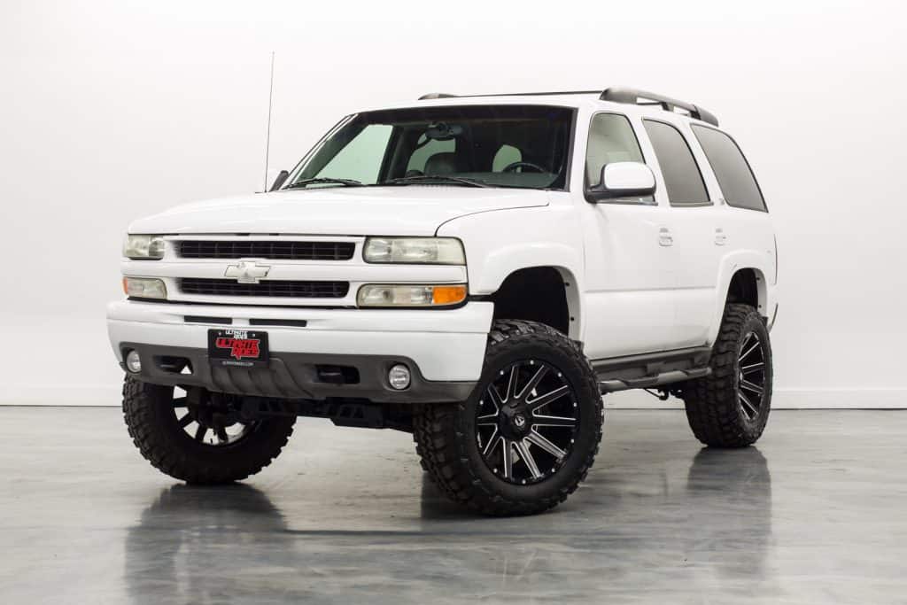 2003 white lifted chevy tahoe