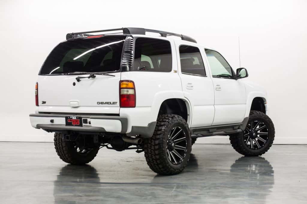 2003 white lifted chevy tahoe