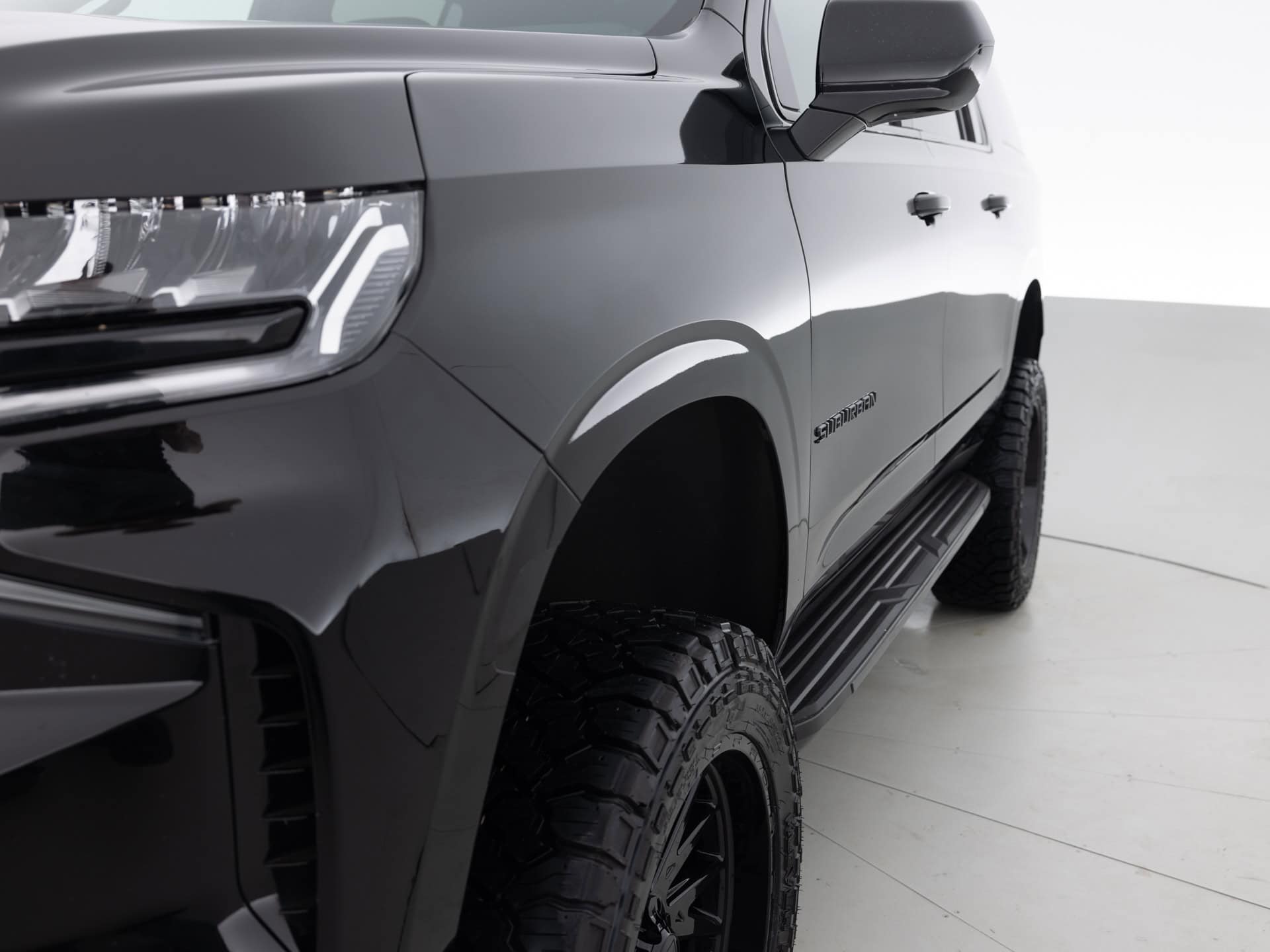 black chevrolet suburban lt 3