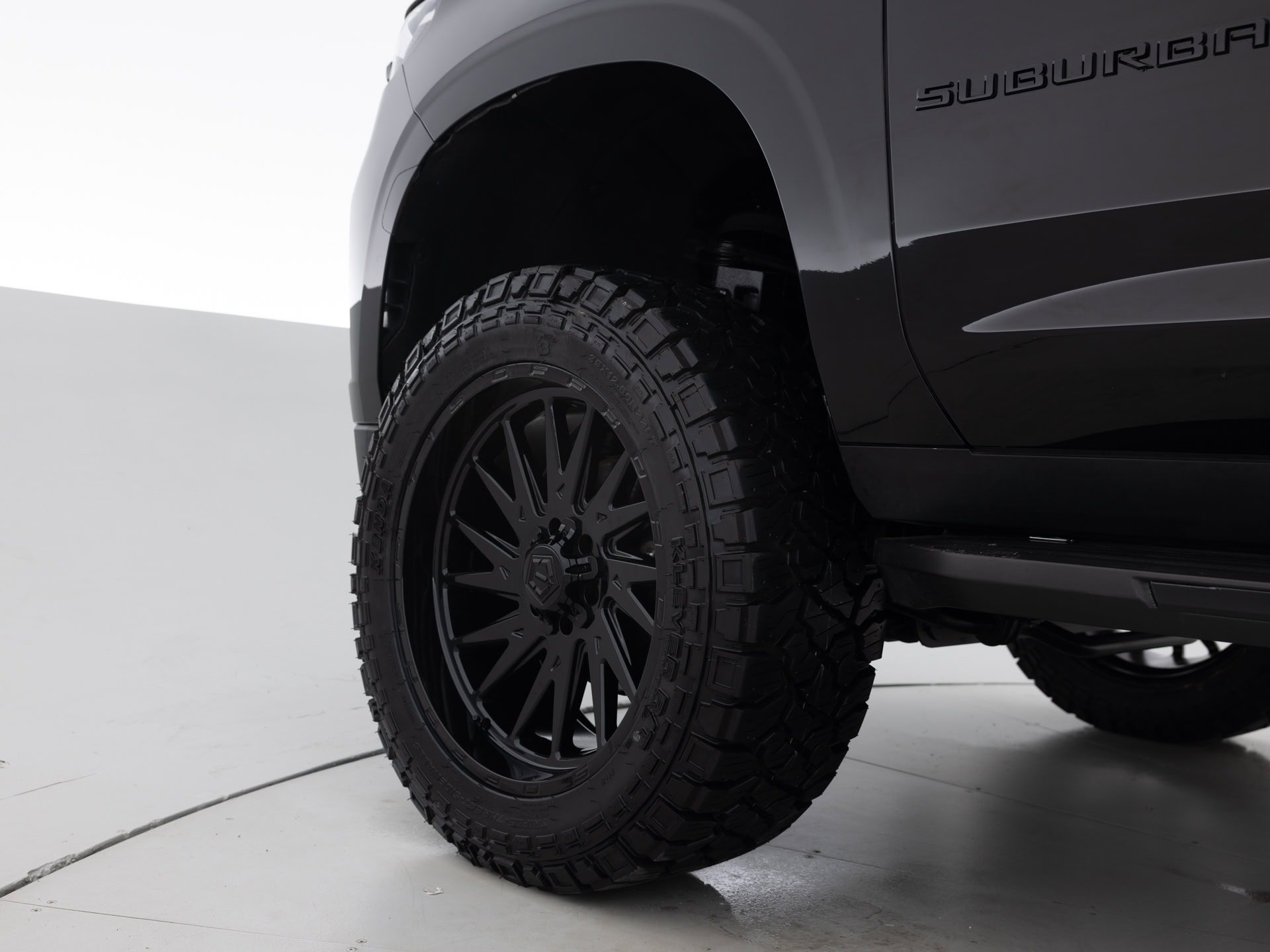 black chevrolet suburban lt 7