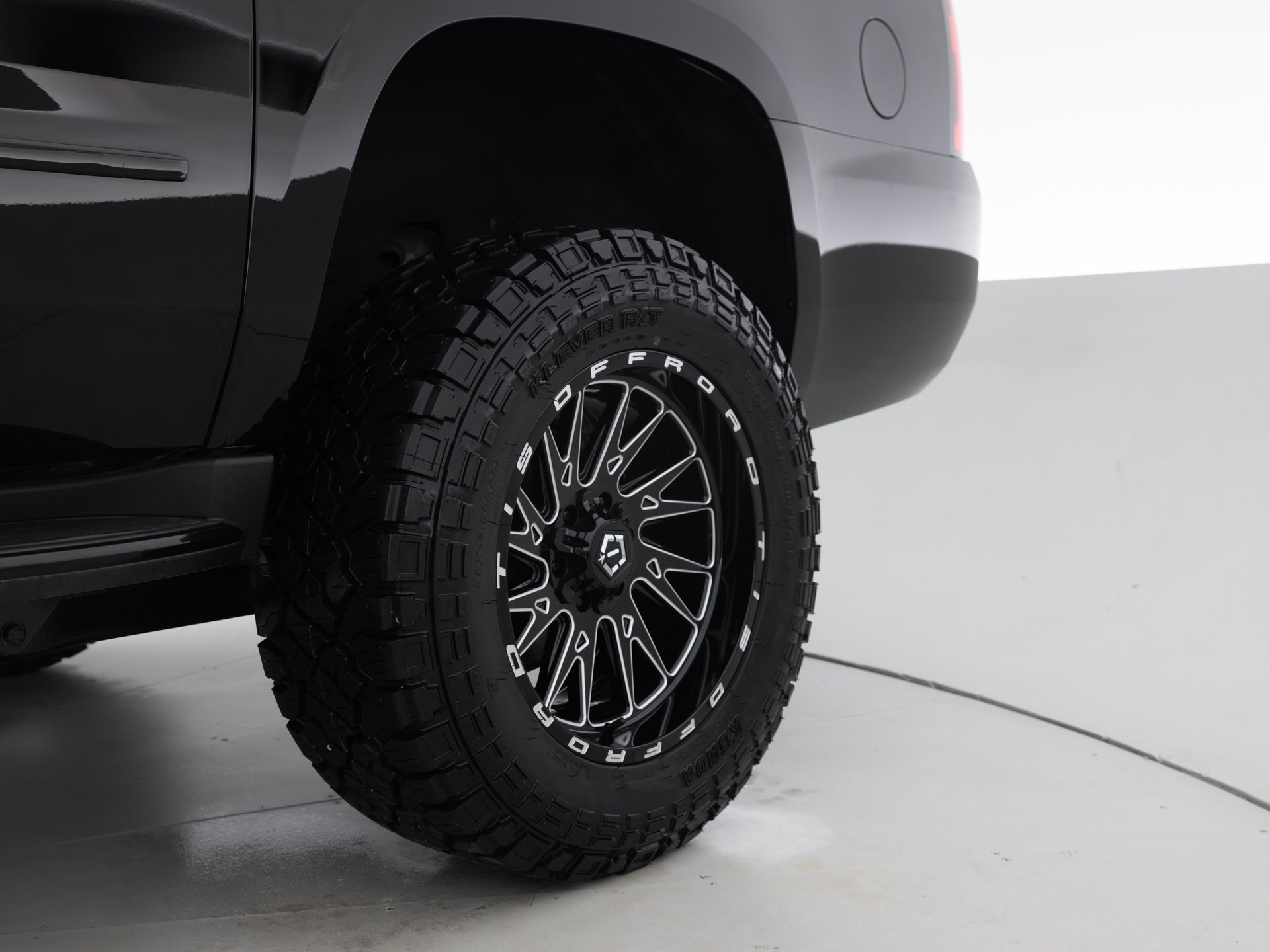 black chevrolet suburban prem 10