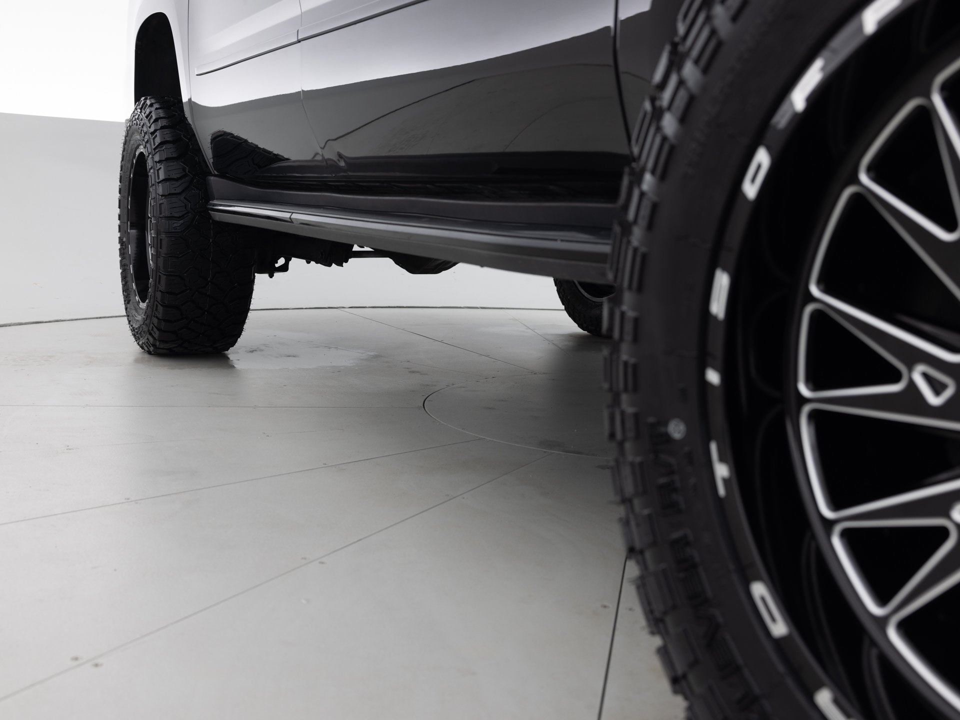 black chevrolet suburban prem 13