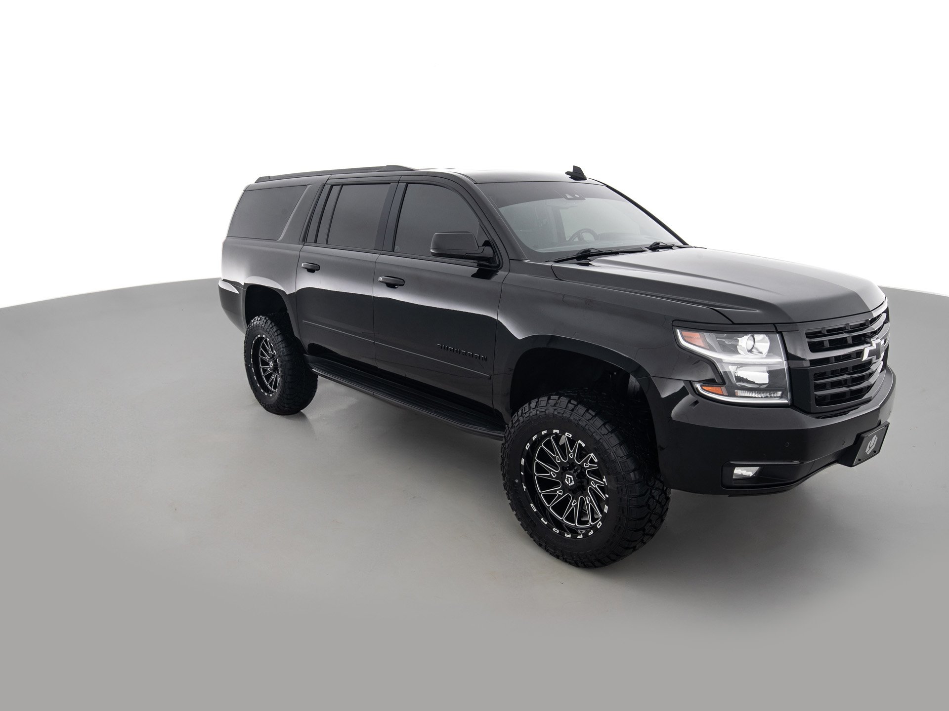 black chevrolet suburban prem 2
