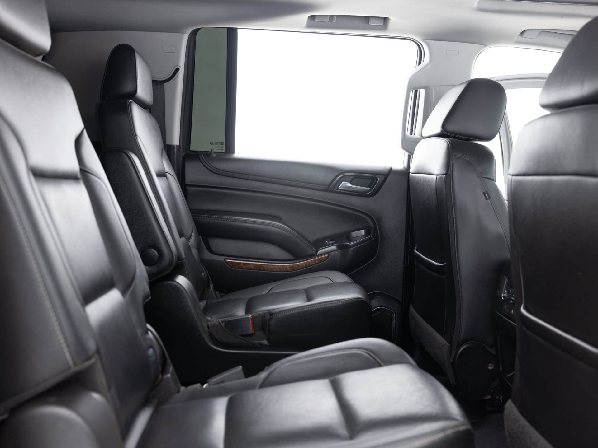 black chevrolet suburban prem 25