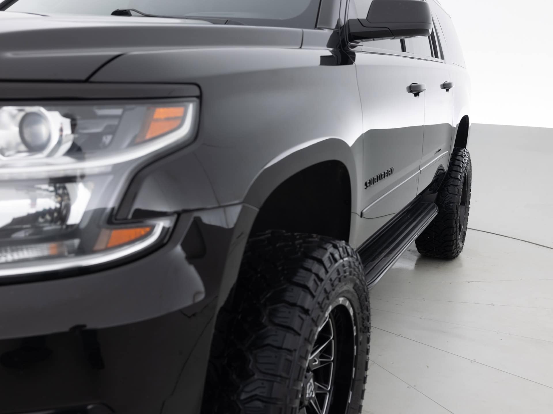 black chevrolet suburban prem 3