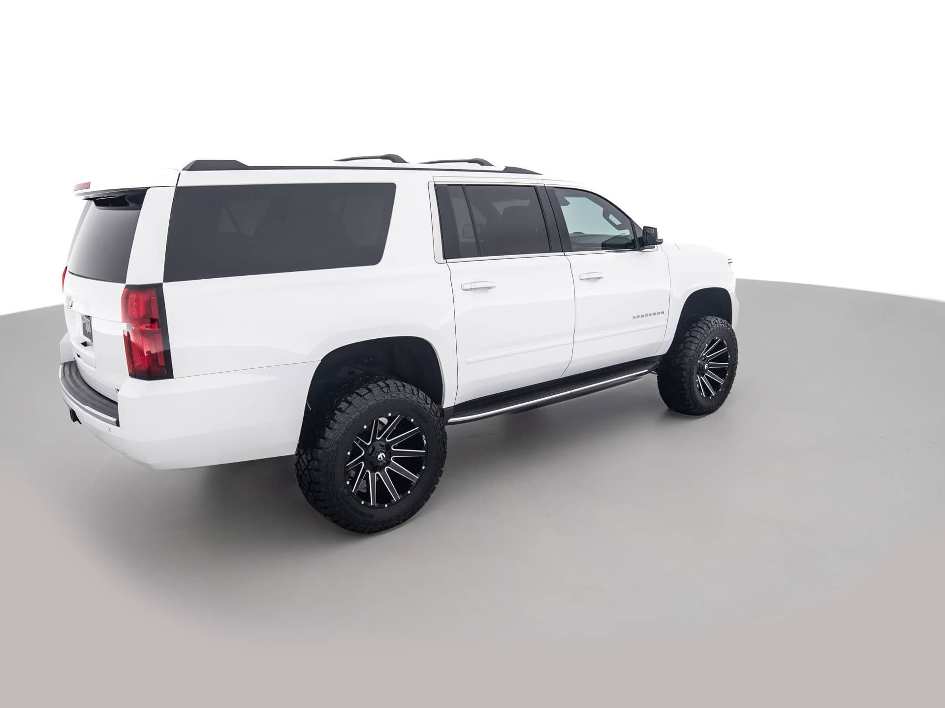 black chevrolet suburban prem 4