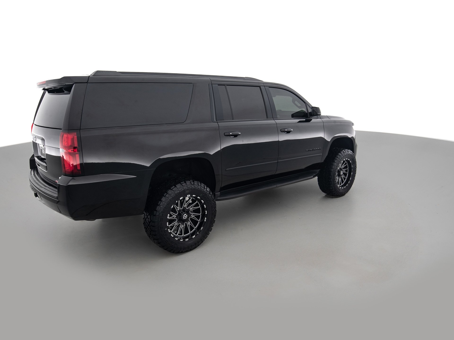 black chevrolet suburban prem 4