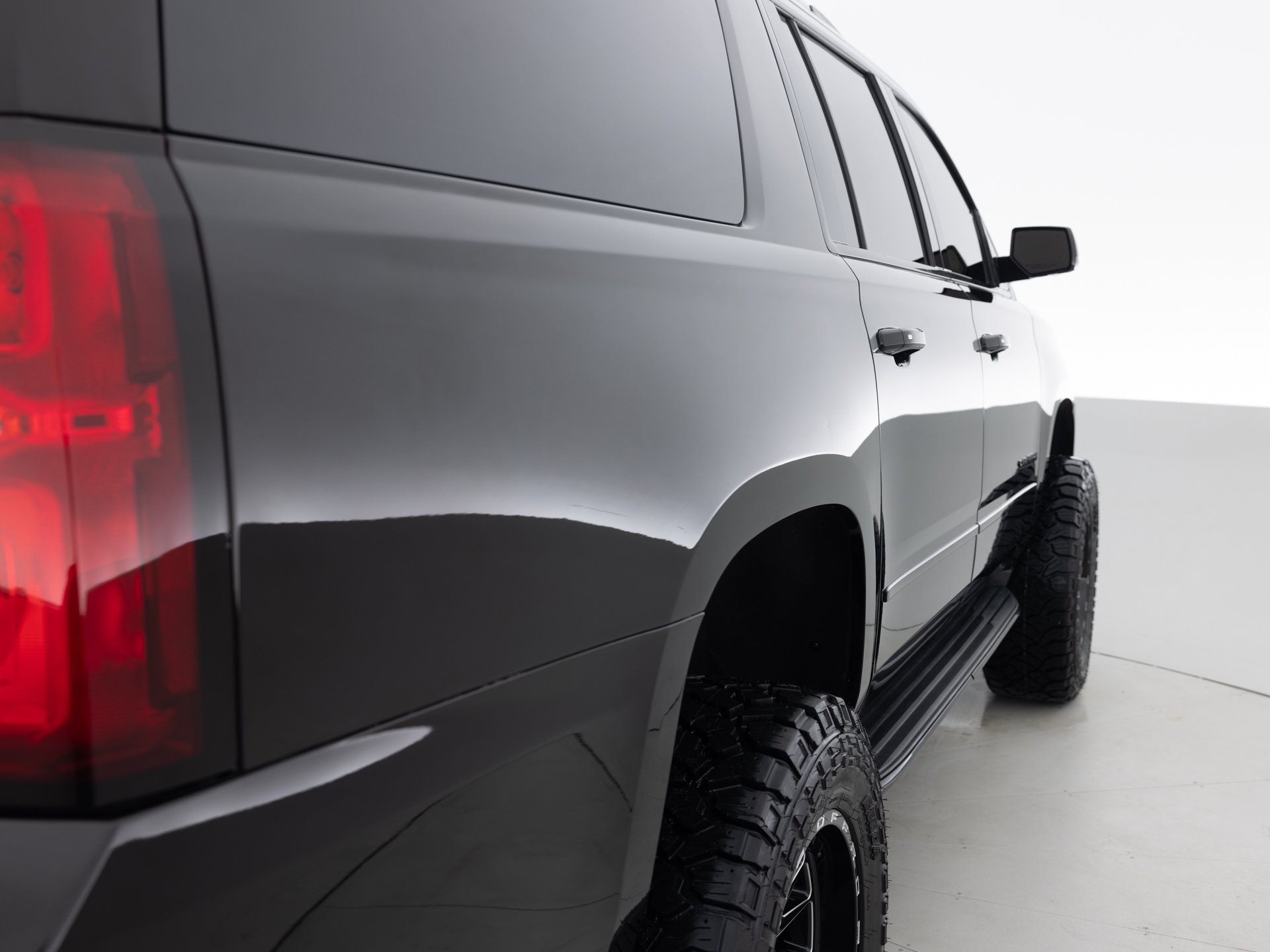 black chevrolet suburban prem 5