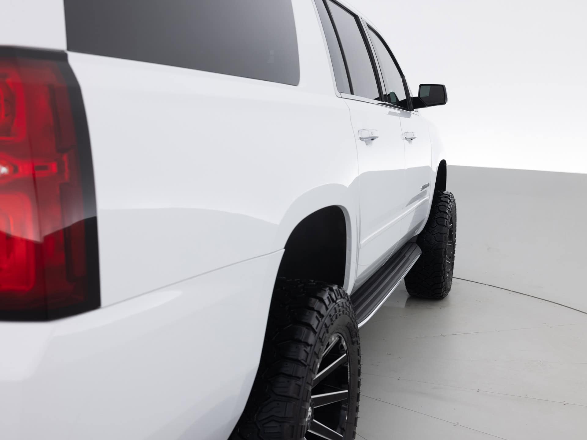 black chevrolet suburban prem 5