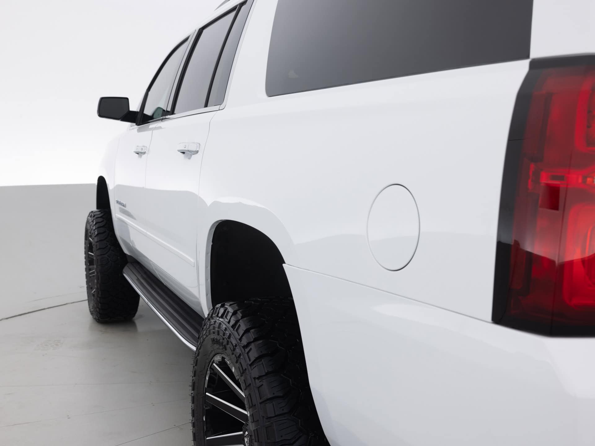 black chevrolet suburban prem 6