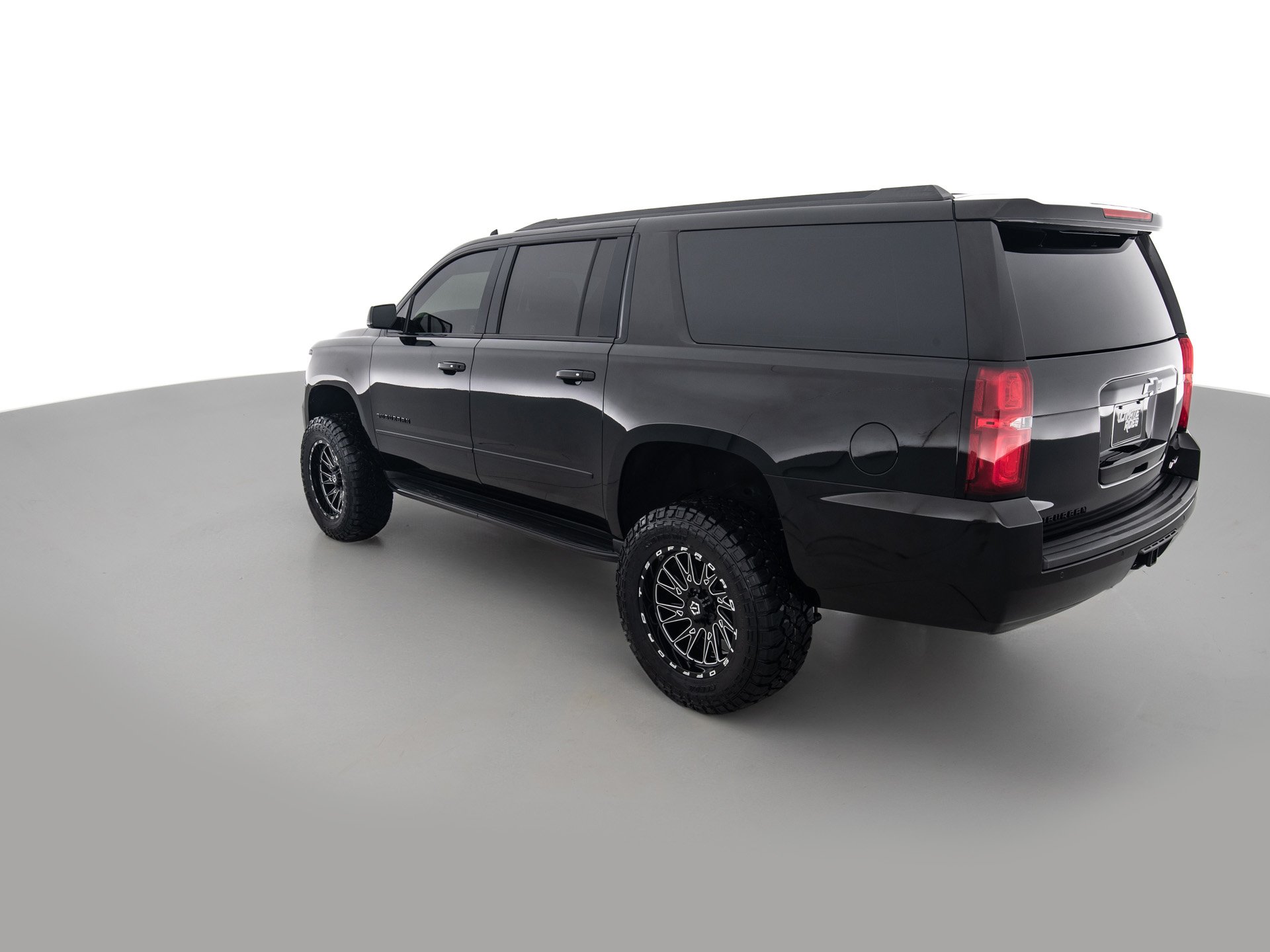 black chevrolet suburban prem 6