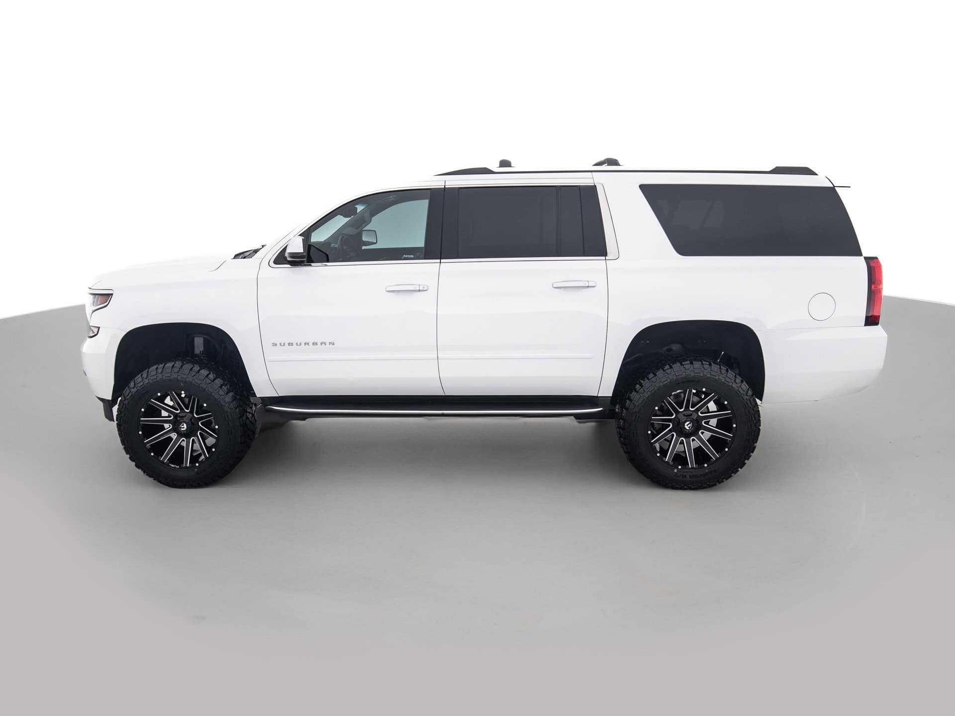 black chevrolet suburban prem 7