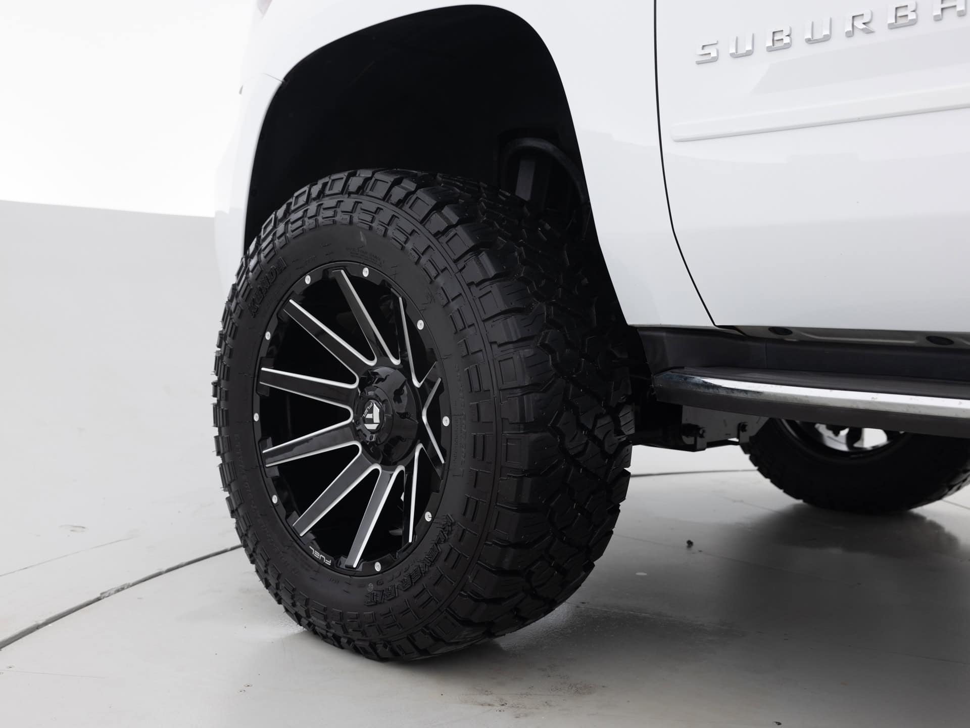 black chevrolet suburban prem 9
