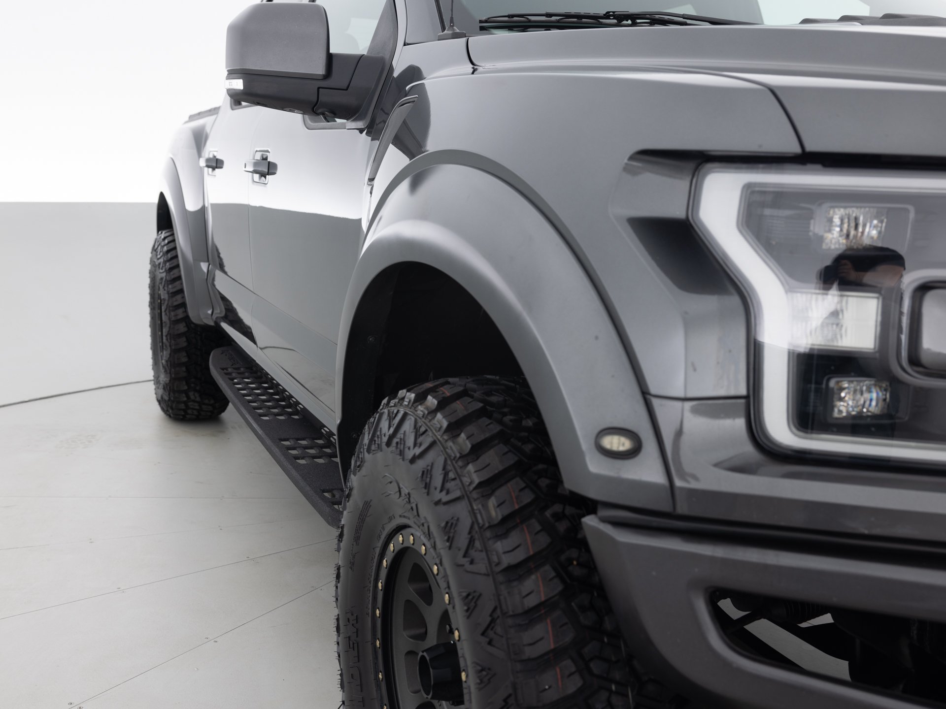 black ford f150 raptor 4