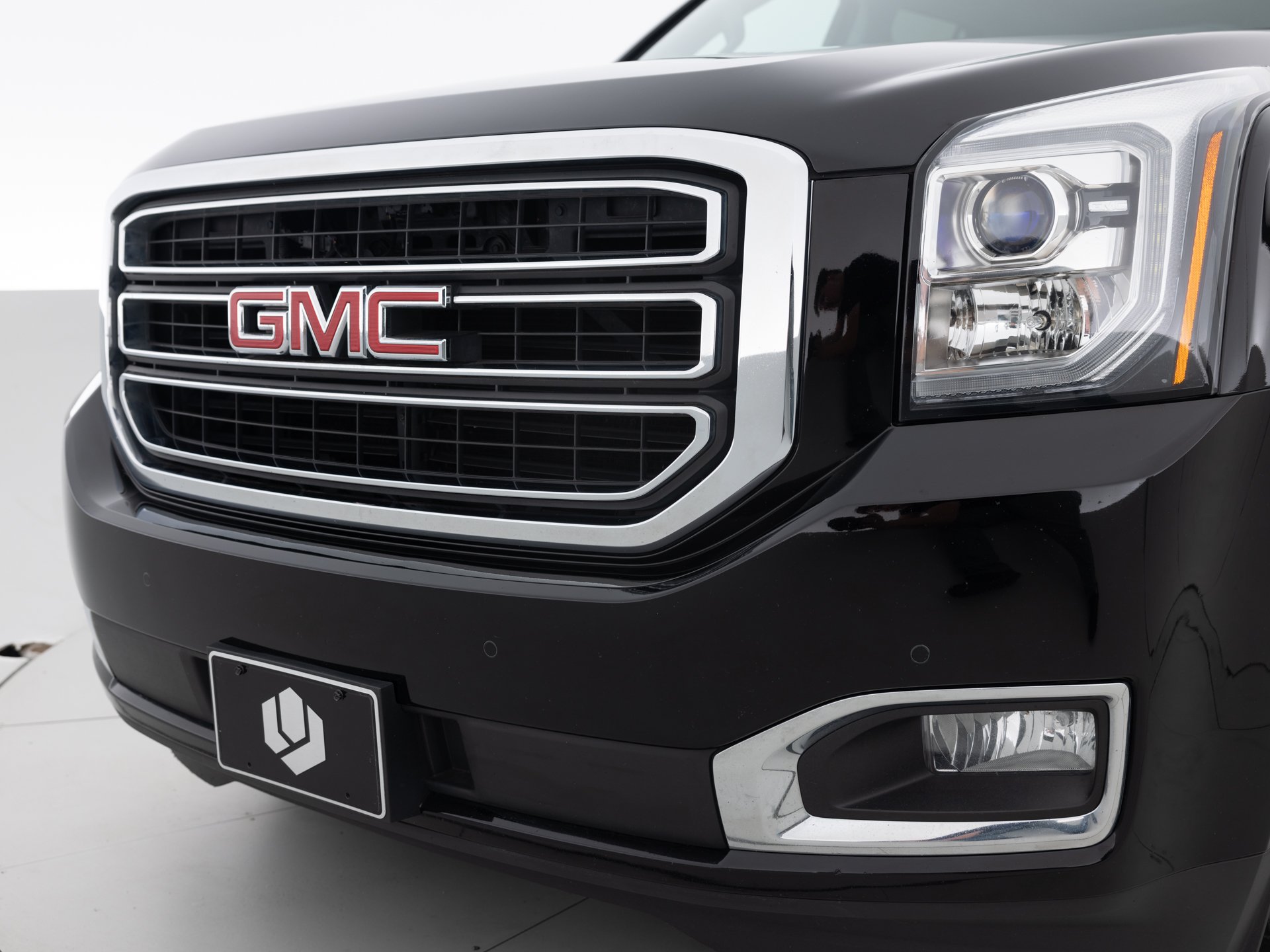 black gmc yukon slt 7