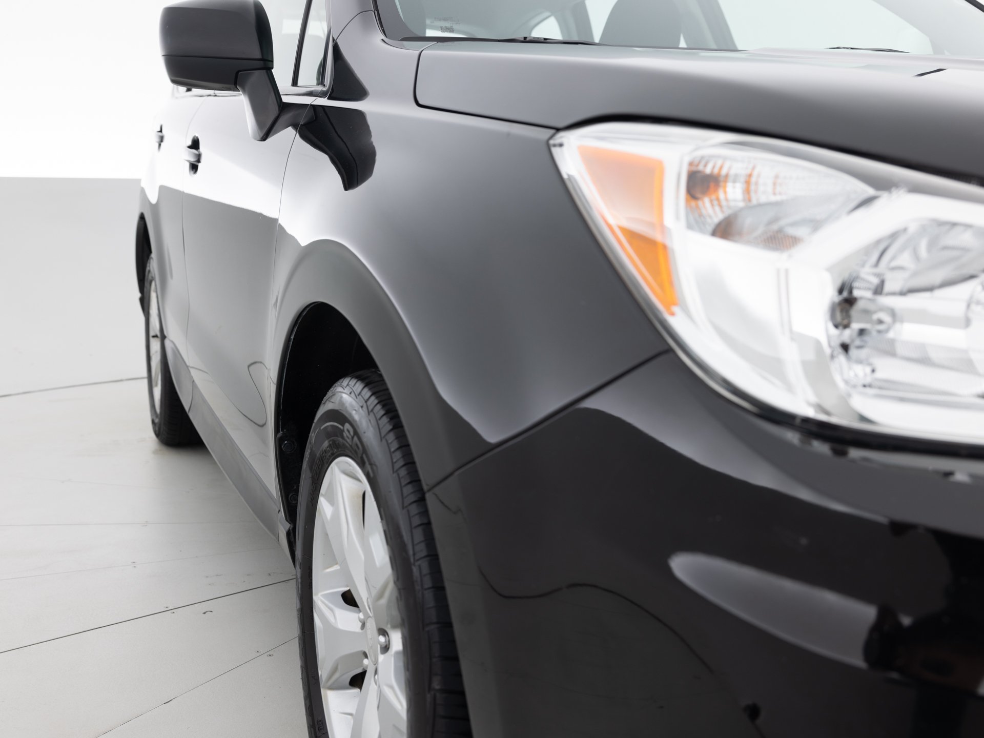 black subaru forester wagon 4