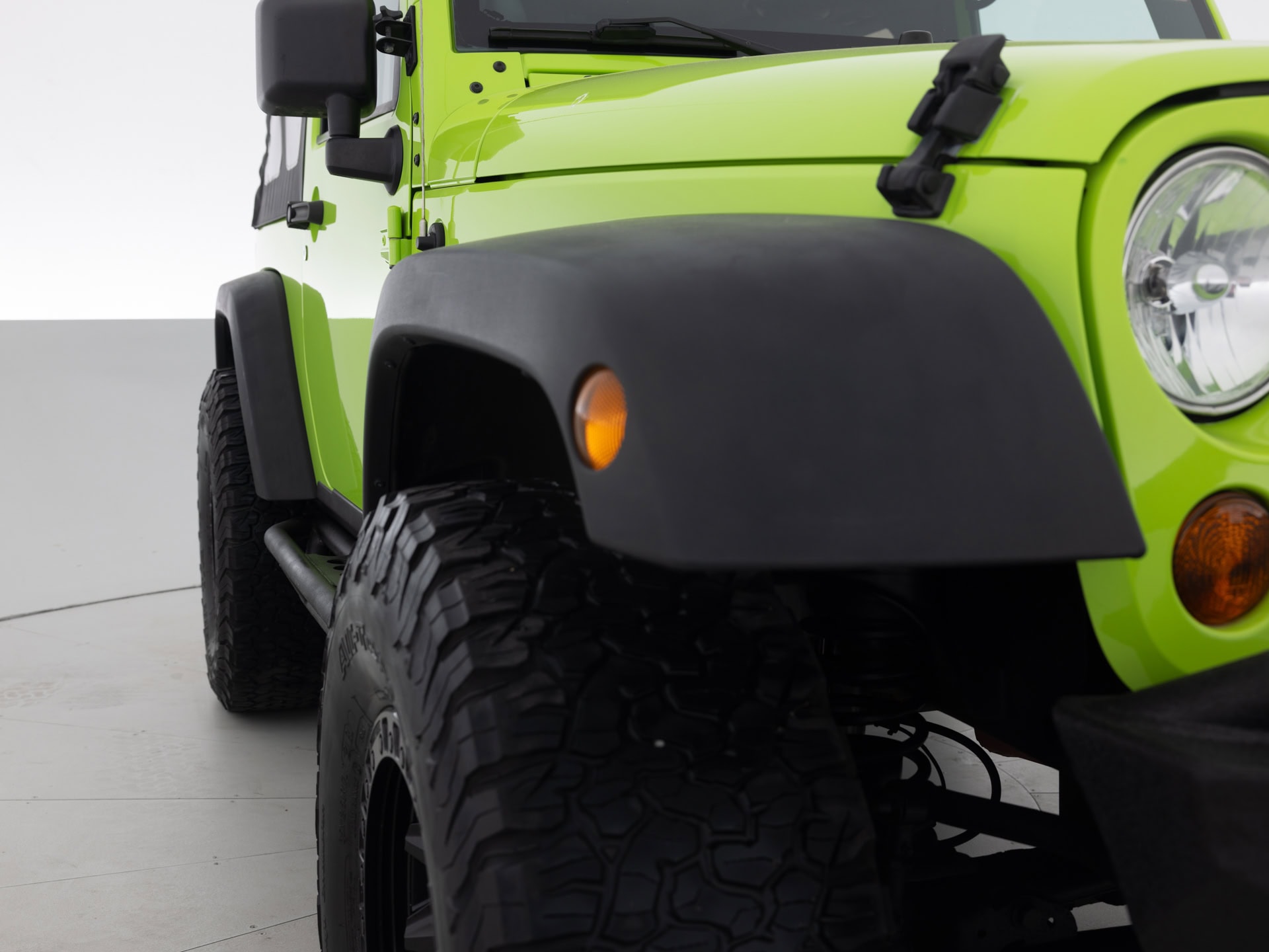 green jeep wrangler sport 4