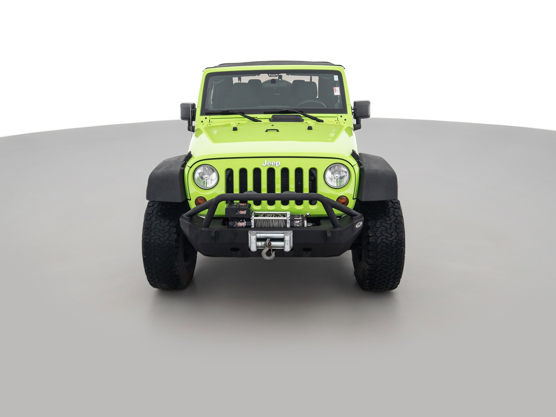 green jeep wrangler sport