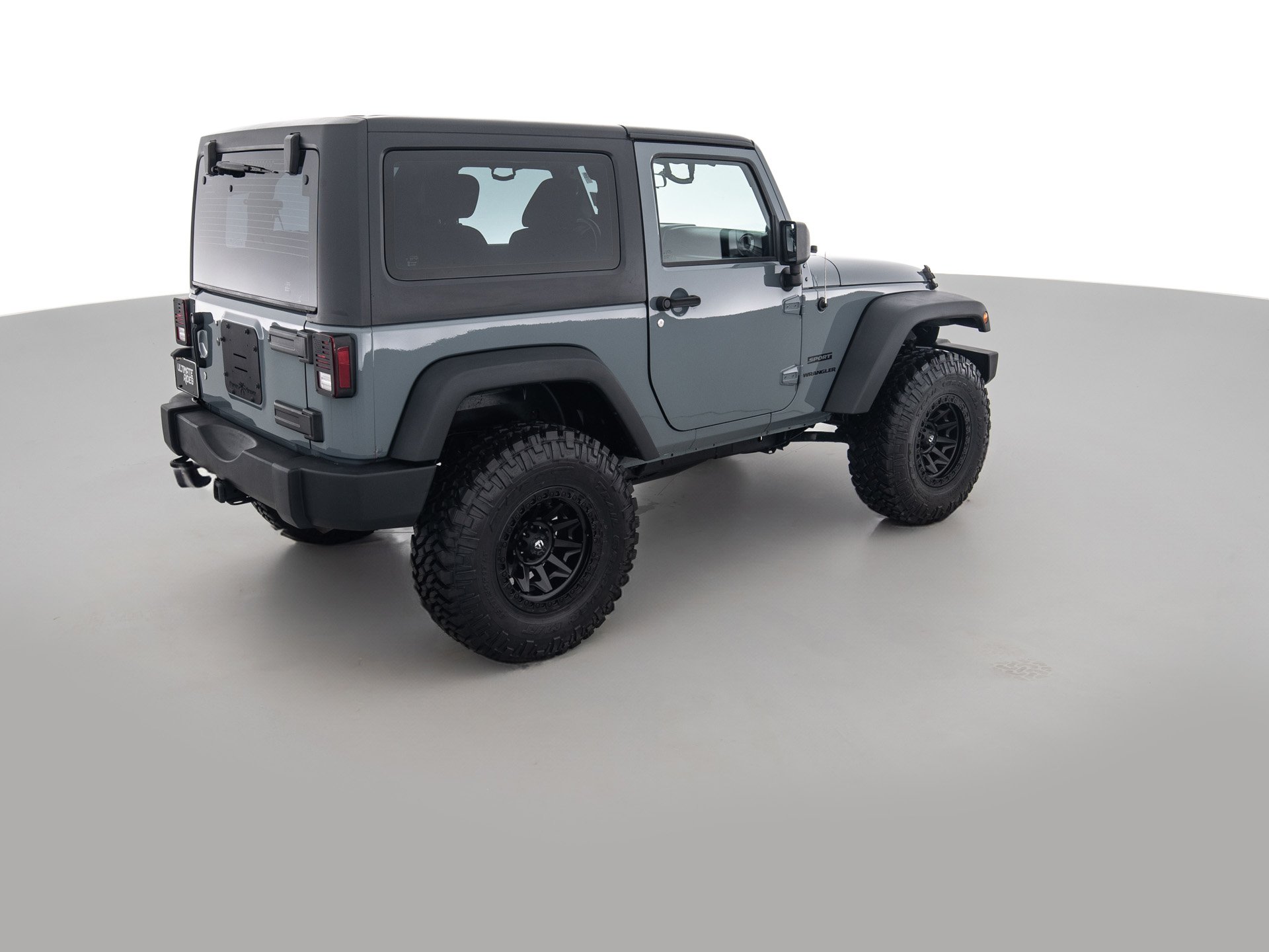 grey jeep wrangler sport 4