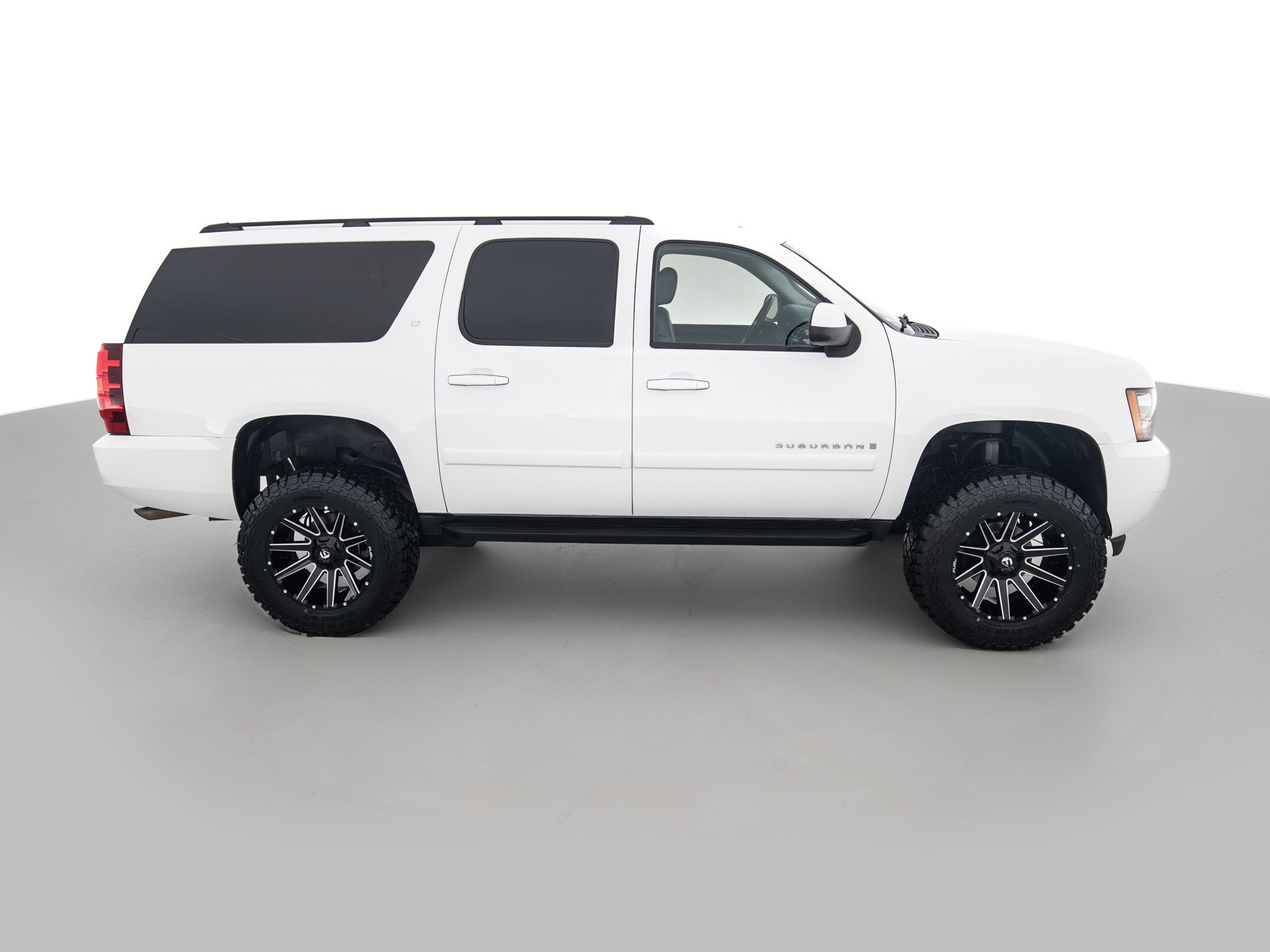 white chevrolet suburban lt 3