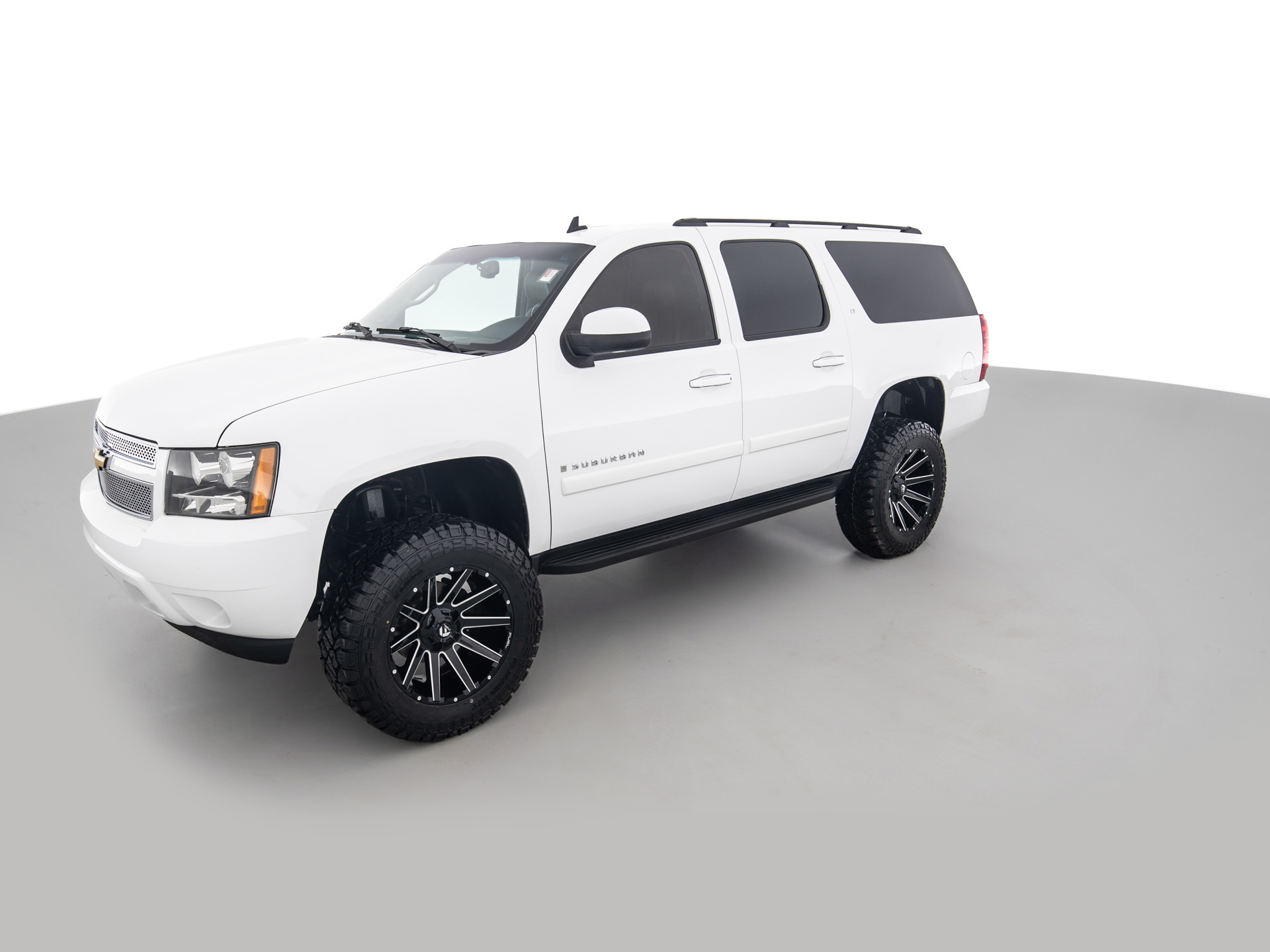 white chevrolet suburban lt 8