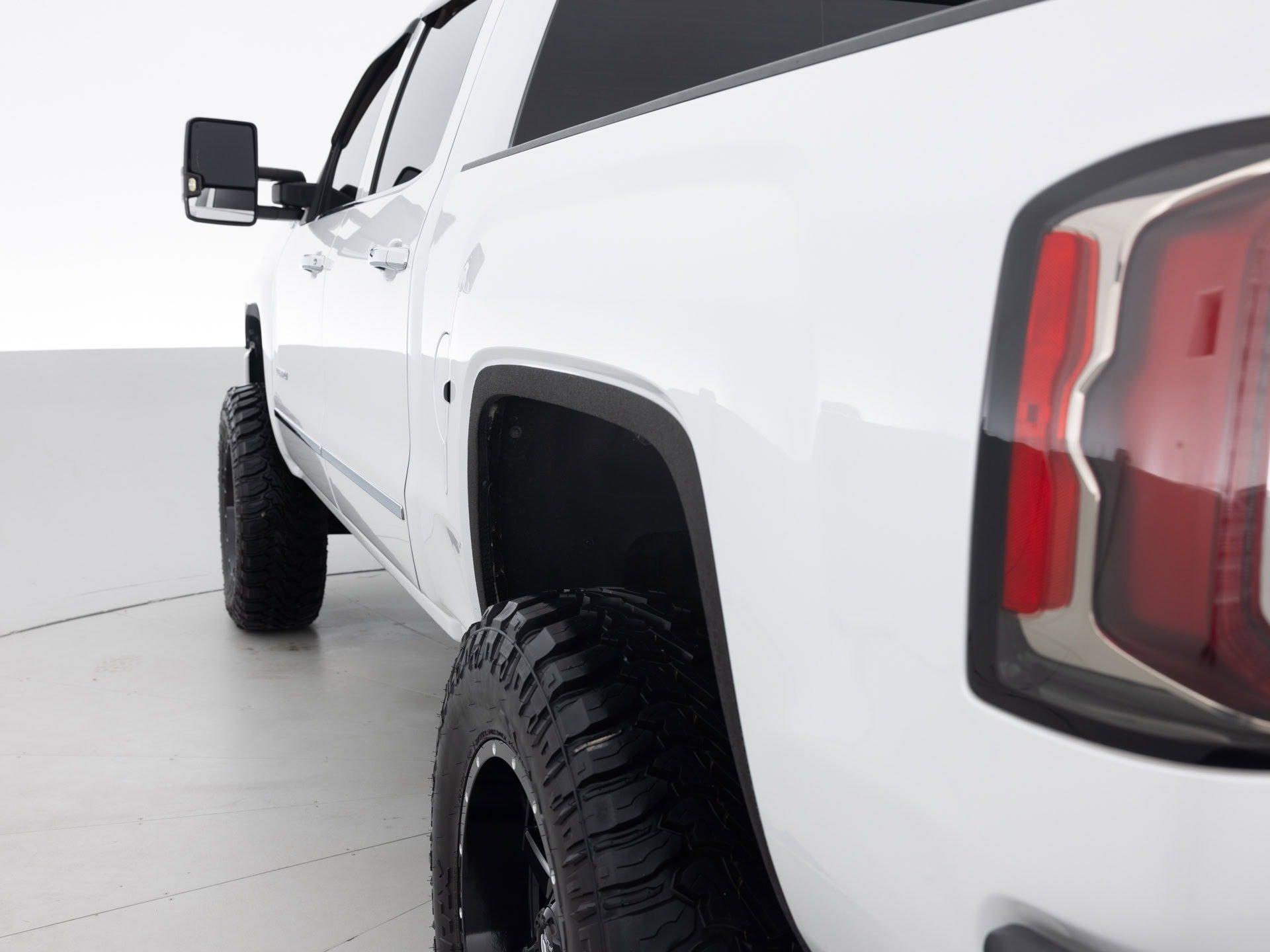 white gmc sierra denali 6