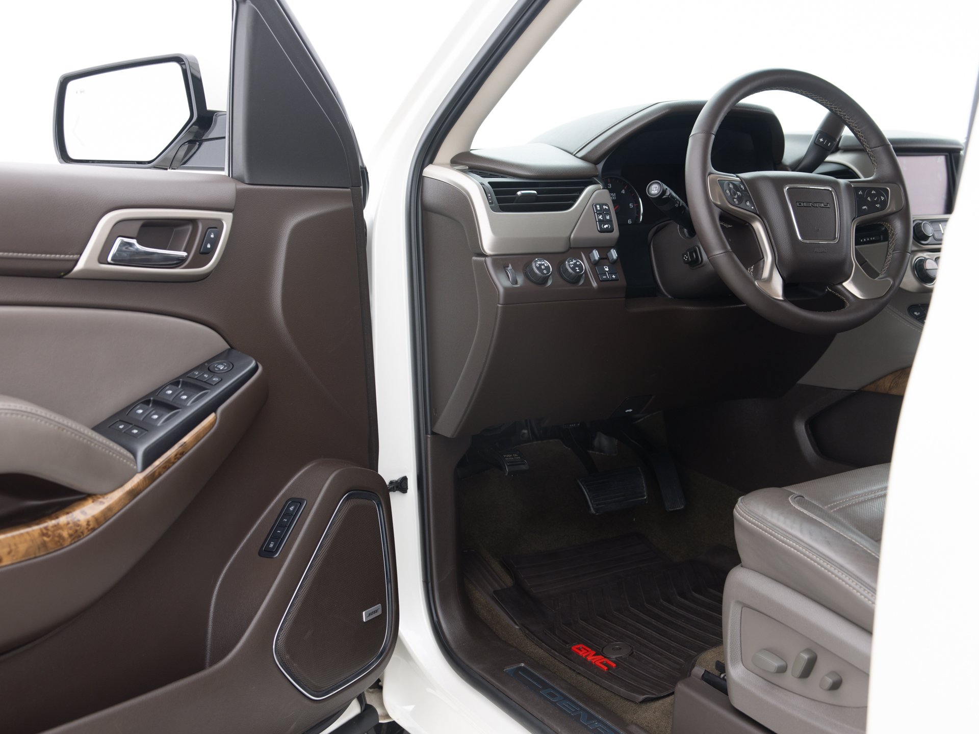 white gmc yukon denali 14