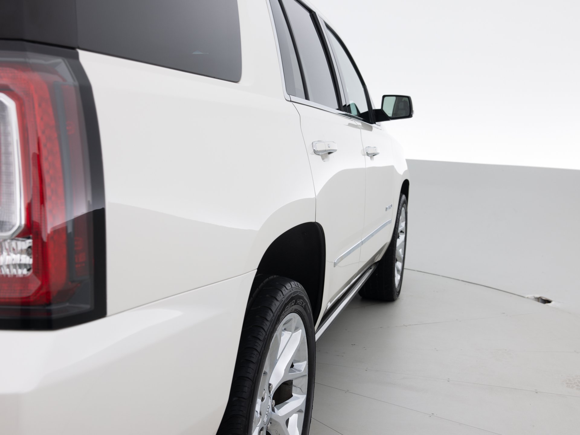 white gmc yukon denali 5
