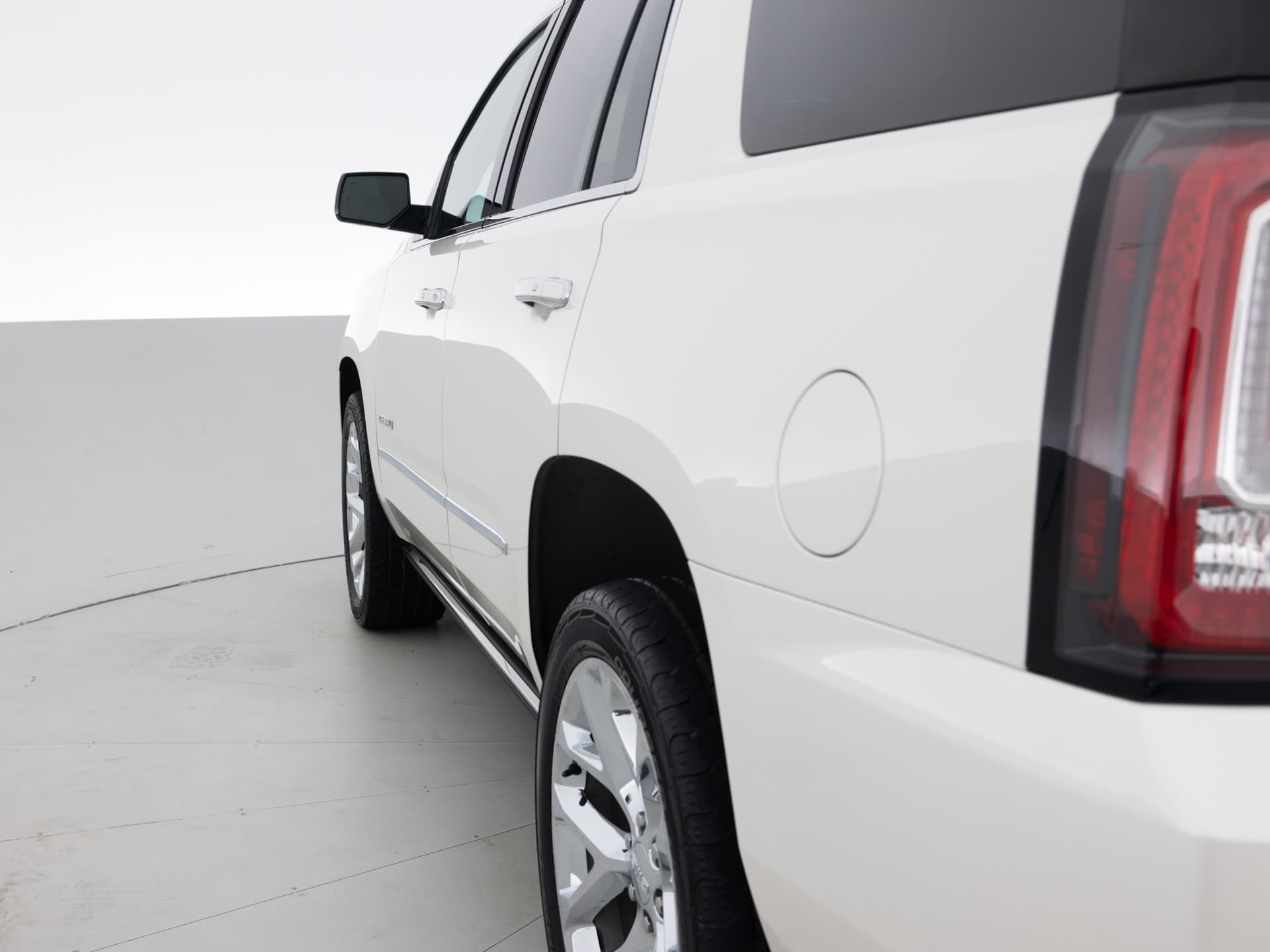 white gmc yukon denali 6