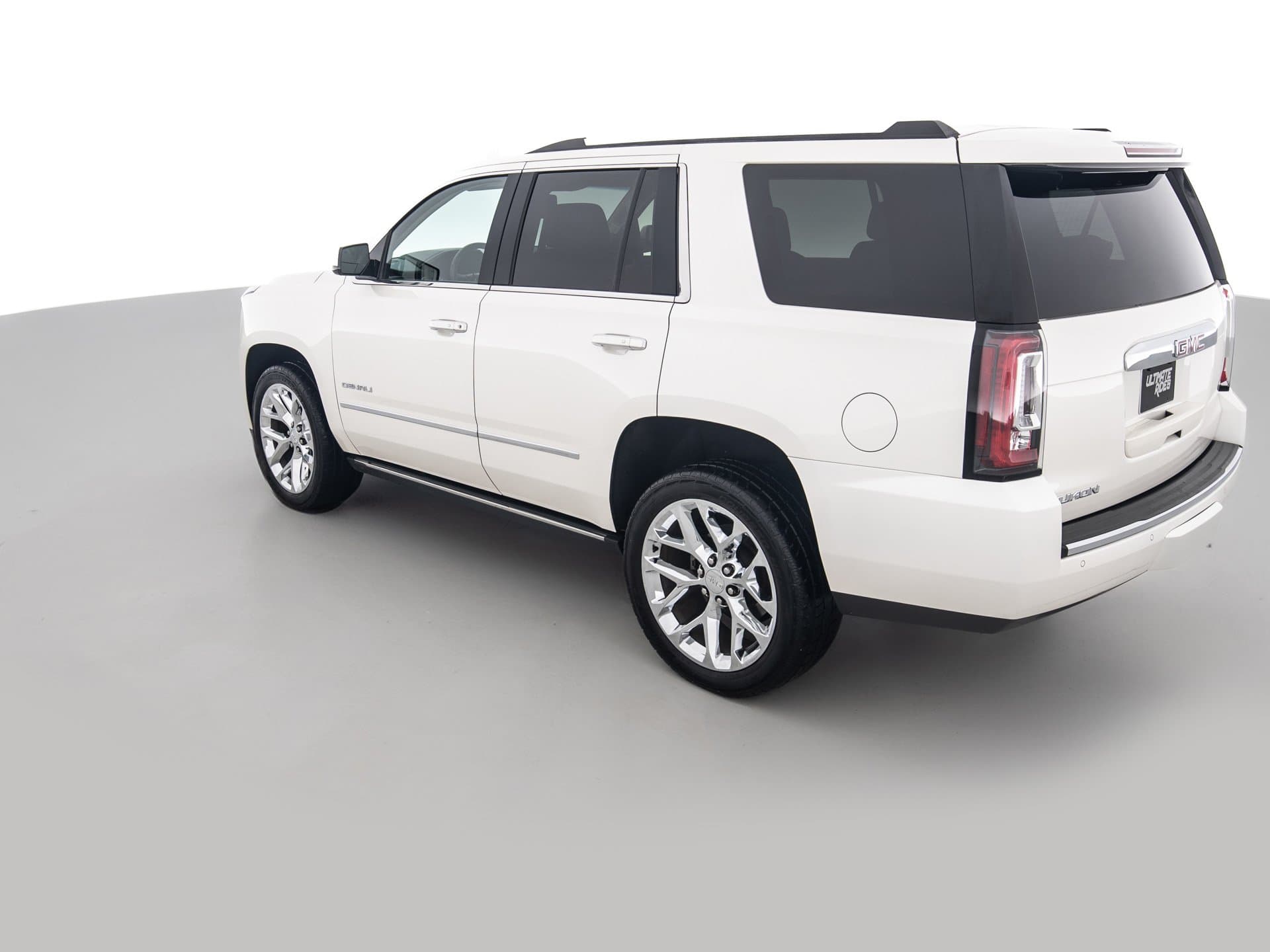 white gmc yukon denali 6