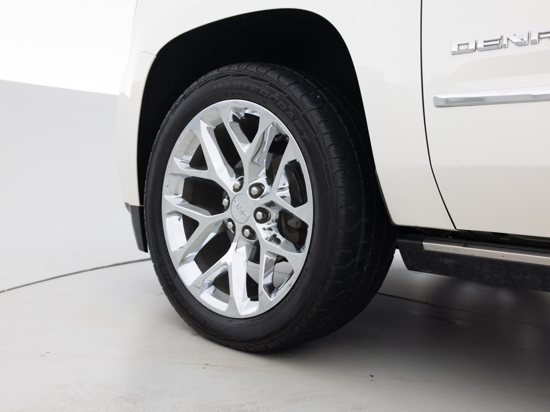 white gmc yukon denali 7