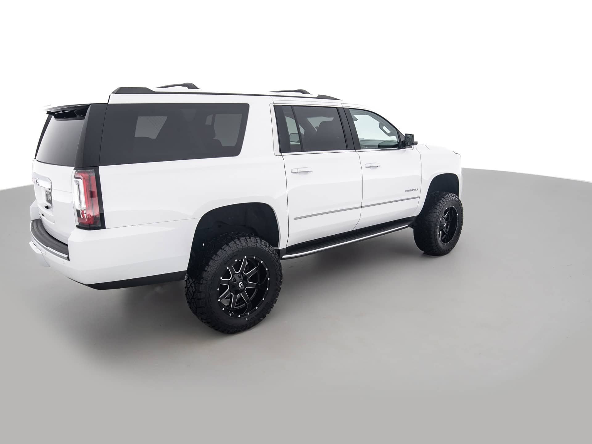 white gmc yukon xl 4